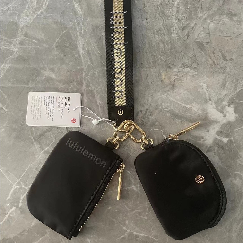 Brand new with tags Lululemon dual pouch keychain